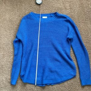Long sleeve rich blue sweater.